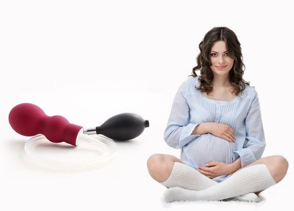 Portrait of the young pregnant woman